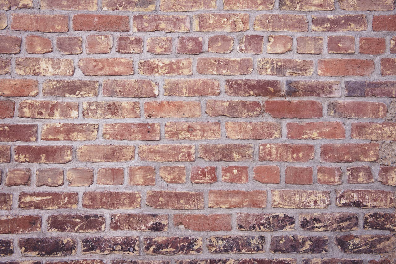 High-quality image of a classic red brick wall, perfect for design or architectural projects.